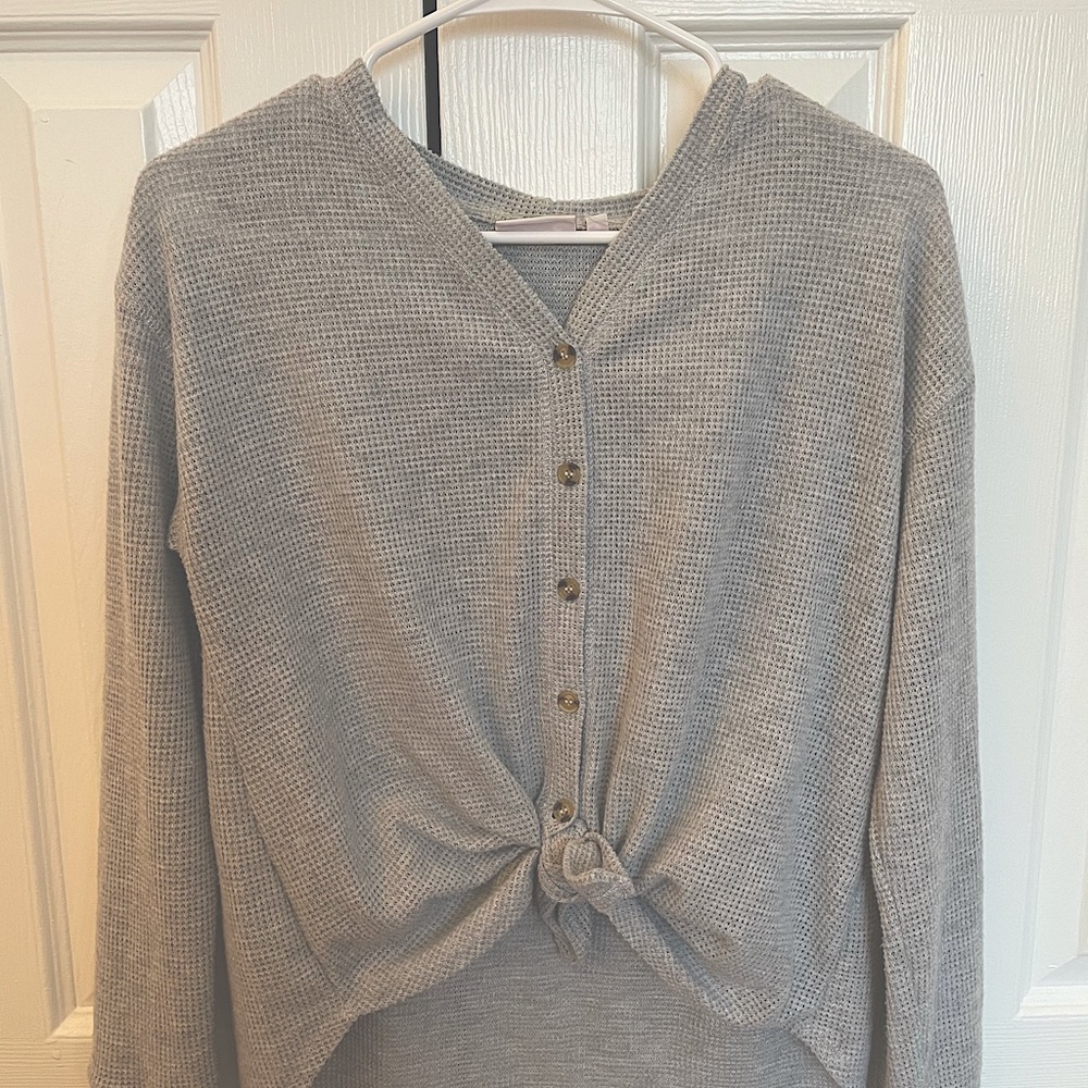 Gray knit button down top with tie in the front